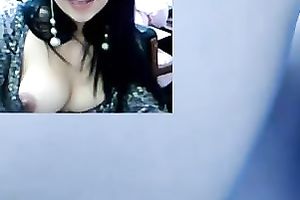 Pretty brunette hair toys her coochie to big O during webcam show