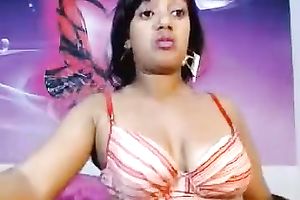 Webcam video with a bulky Indian hoe kneading her large naturals