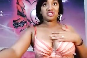 Webcam video with a bulky Indian hoe kneading her large naturals