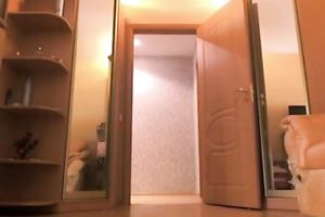 Big-breasted dark brown enjoys riding a sextoy in front of a livecam