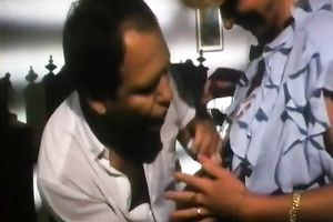 Retro blond in underware makes out with a guy and sucks his prick