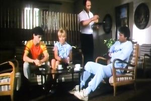 Retro blond in underware makes out with a guy and sucks his prick