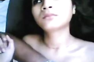 Pretty gal sucks her BF's wang in a car and lets him touch her love melons