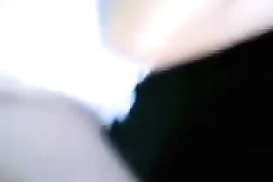 Pretty gal sucks her BF's wang in a car and lets him touch her love melons