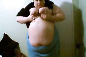 Webcam solo with an non-professional fattie stripping and exposing her body