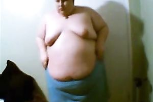 Webcam solo with an non-professional fattie stripping and exposing her body