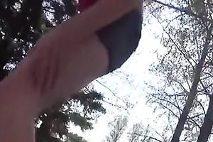 Pigtailed brunette hair hottie fingers her bawdy cleft in outdoor solo video