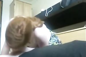 My hot redhead GF enjoys engulfing my boner in homemade video