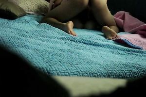 Hidden webcam in the bedroom films how a stud bonks Asian BBC slut