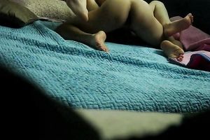 Hidden webcam in the bedroom films how a stud bonks Asian BBC slut