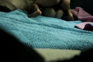 Hidden webcam in the bedroom films how a stud bonks Asian BBC slut