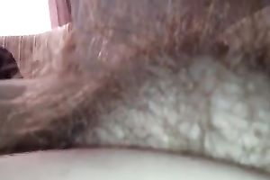 I love rubbing my girlfriend's hirsute twat in front of a camera