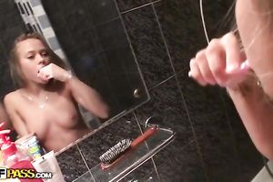 Alluring blond lets a chap finger her cunt in the washroom