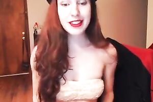 Redhead princess boasts of her perfect body in front of a livecam
