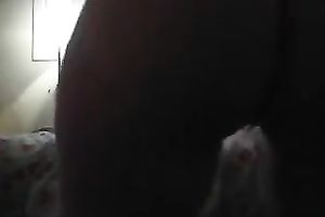 Sexy wench with phone in one hand and marital-device in the other one