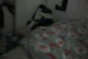 Sexy wench with phone in one hand and marital-device in the other one