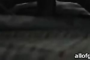 Sexy wench with phone in one hand and marital-device in the other one