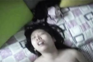 Dark-haired Japanese nympho receives pounded in missionary position