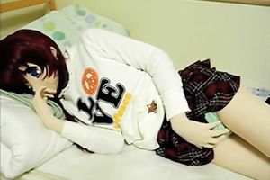 Asian hoe wearing a mask masturbates her slit indoors