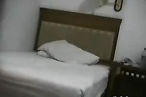 Asian pair having an astonishing sex jointly in their hotel room
