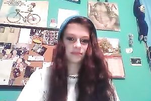 Redhead legal age teenager cutie with serious face masturbating on cam