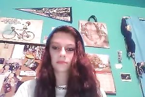 Redhead legal age teenager cutie with serious face masturbating on cam