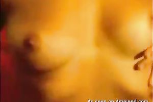 Mysterious webcam girl plays with her meatballs and rubs her taut shaved cooch