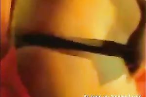 Mysterious webcam girl plays with her meatballs and rubs her taut shaved cooch