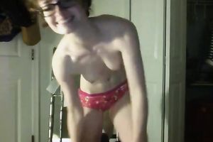 Lustful four eyed wonk takes off clothes on a camera