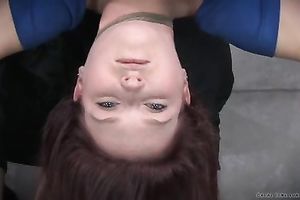 Sweet redhead honey with great body suspended upside down by her guy