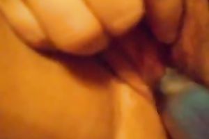 Check out what my aged black cock sluts does with her snatch on webcam