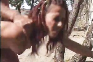 Teen with black hair blows outdoors and enjoys rear banging