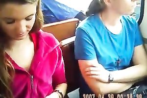 Trying to catch her love melons on my camera in the bus