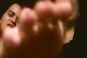 Playful Latin students boast with their slender pedicured feet