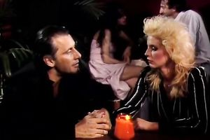 Sexy golden-haired chick sucks two hard dongs deepthroat. Male+Male+Female