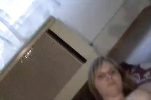 Amateur skank smashes her holes with a cucumber-like dildo