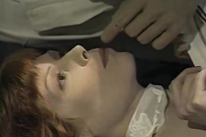 Two sexy and excited women share on weenie on the pool table