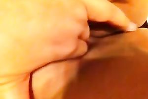 This lewd brunette hair with thick pussy loves fondling her melons