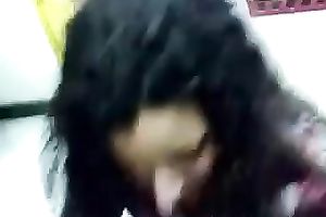 Curly haired cutie sucks her lover's shaft and licks his balls like crazy