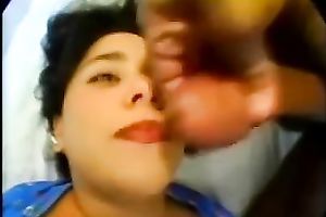 She lies in her daybed and receives her friend's big cock pushing her face hole