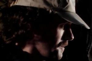 Seductive brunette hair in constricted jeans gives her head