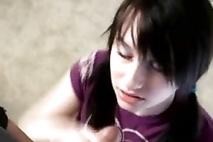 This dirty dark brown legal age teenager wench sucks a ramrod on POV clip