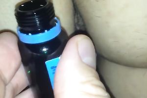 Pouring olive oil on my wife's deliciously pleasant pussy