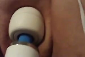 My aged plump amateur wife enjoys playing with a magic wand fake penis
