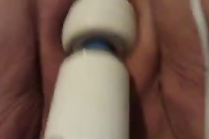 My aged plump amateur wife enjoys playing with a magic wand fake penis