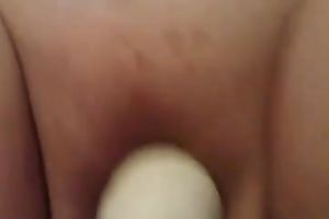 My aged plump amateur wife enjoys playing with a magic wand fake penis