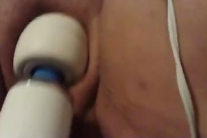 My aged plump amateur wife enjoys playing with a magic wand fake penis