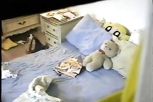 Brunette housewife toys her bawdy cleft in front of a hidden web camera