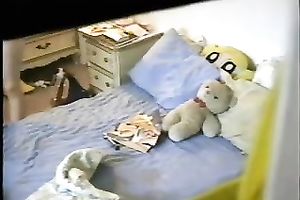Brunette housewife toys her bawdy cleft in front of a hidden web camera