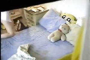 Brunette housewife toys her bawdy cleft in front of a hidden web camera